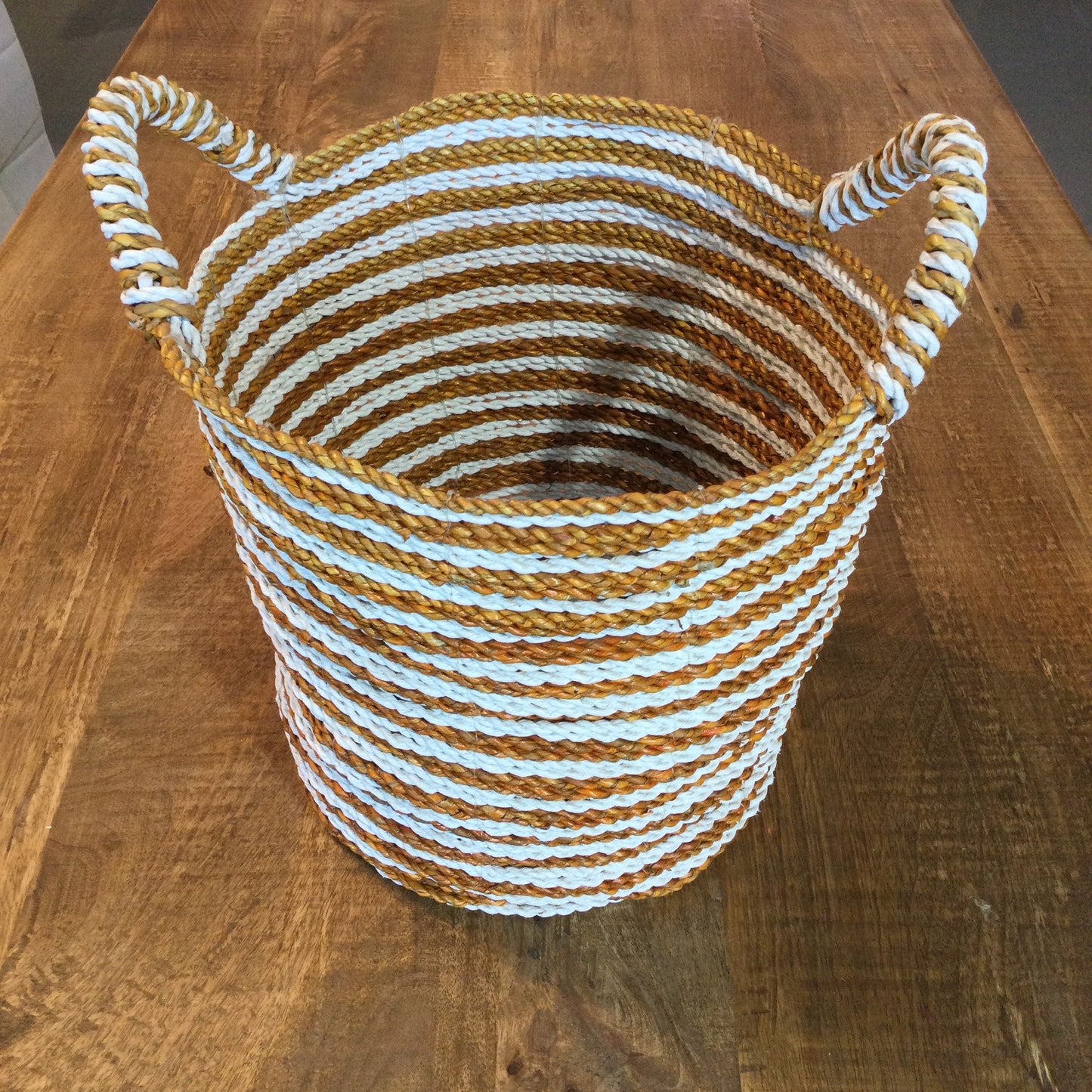 Striped assorted white and color baskets with handle