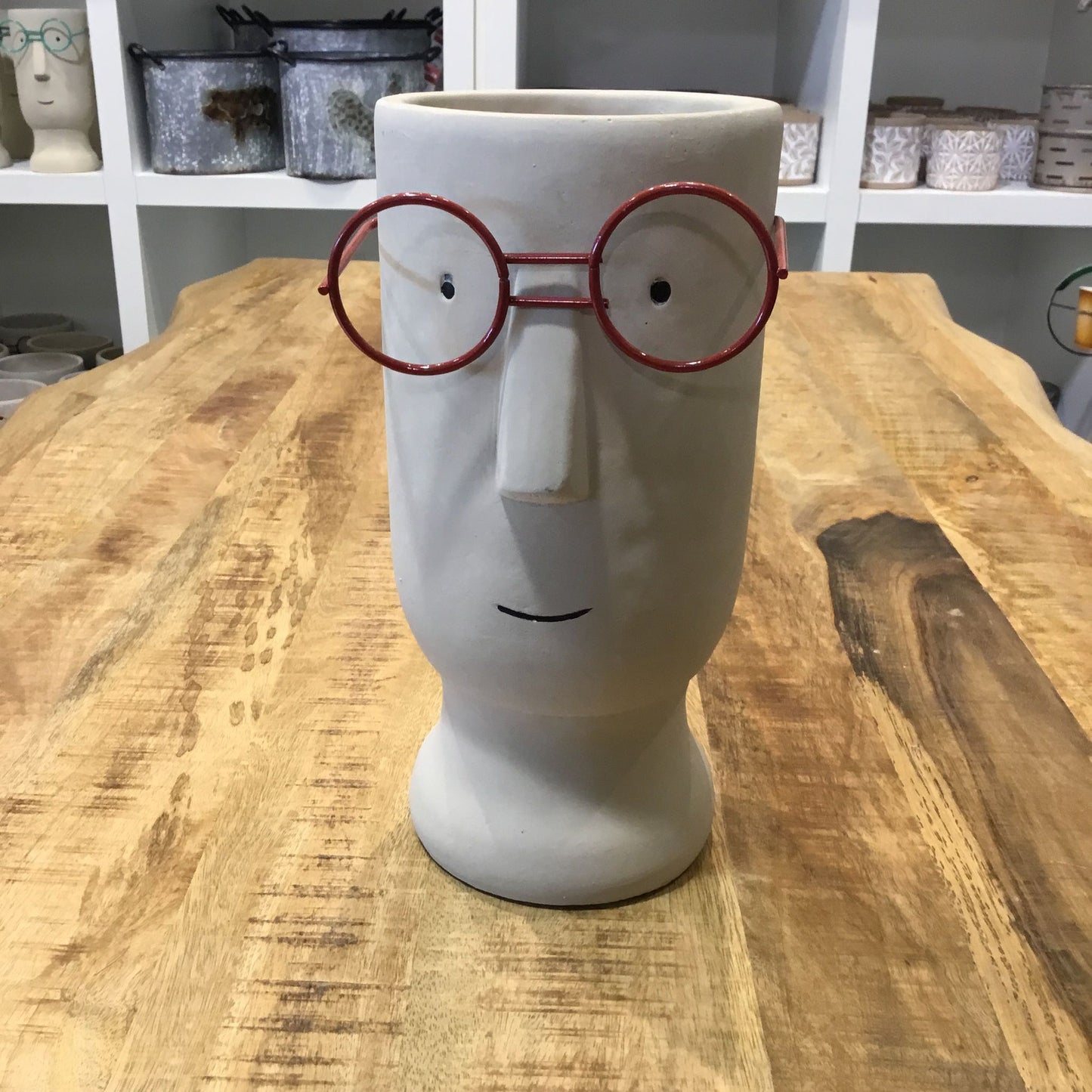 Large Cement Planter of a Face with Glasses