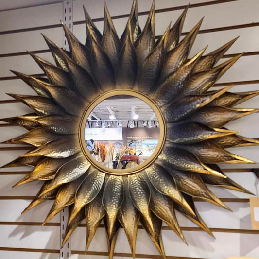 Raven round brass sunburst accent wall mirror